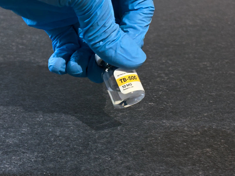 Gently swirling the peptide vial